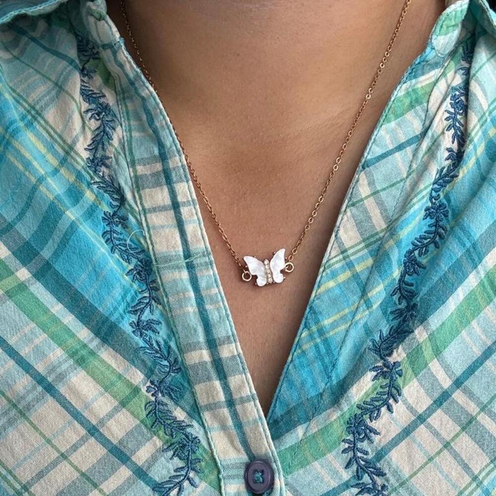 White butterfly pendant necklace with